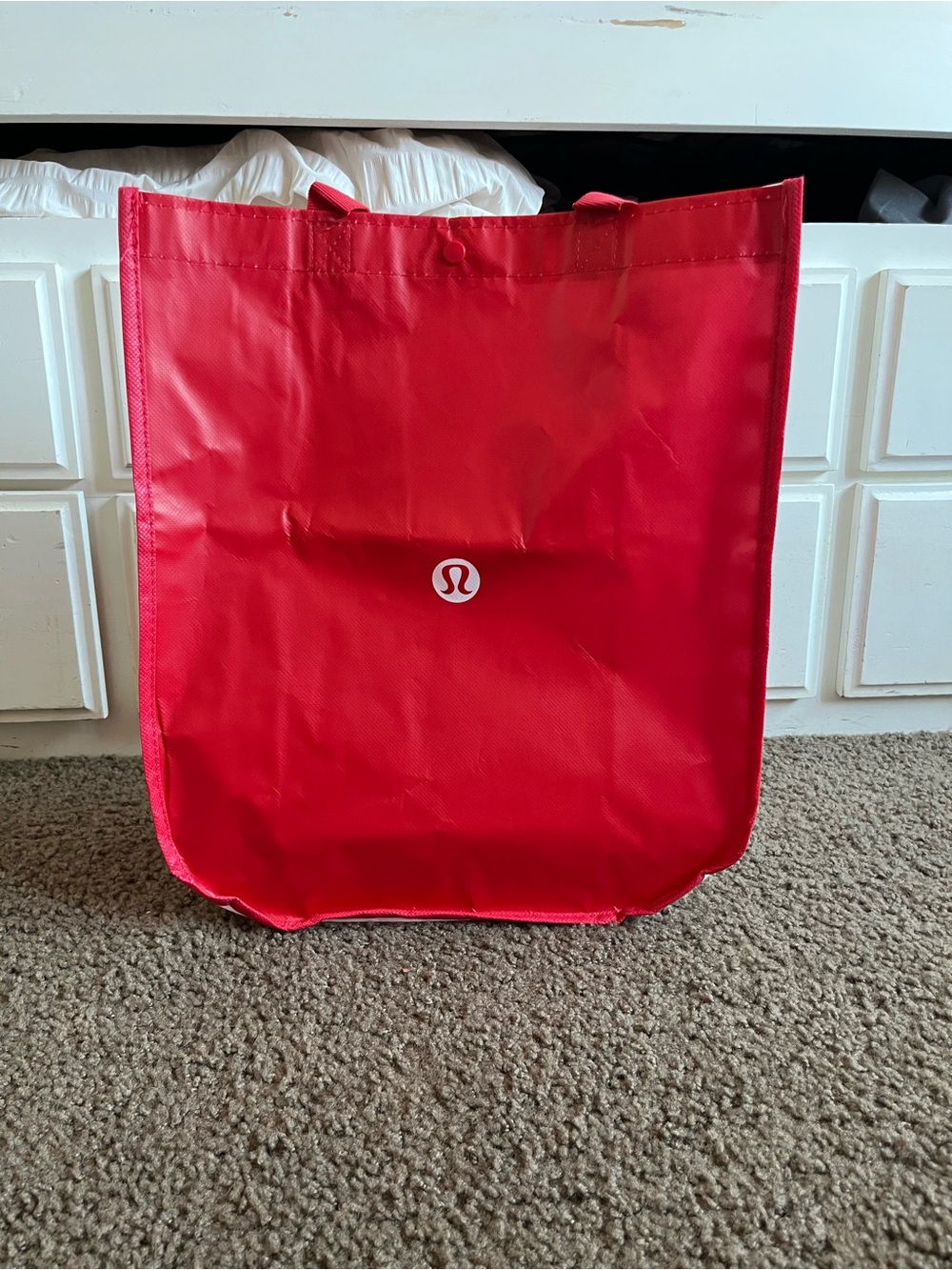 lululemon athletica bright red reusable tote with logo